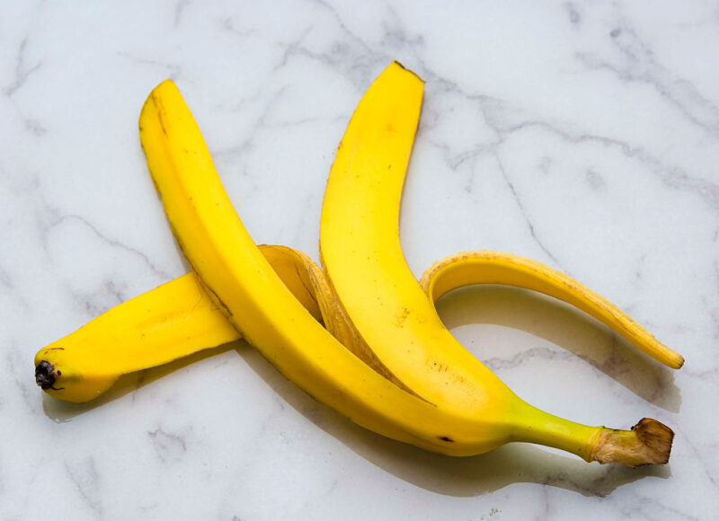 Banana peel placed on a marble countertop