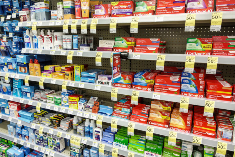 Boxes containing tubes of hydrocortisone cream on store shelves